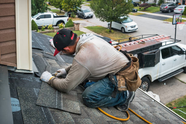 Professional Storm Damage Roof Repair technician working in Weston, TX